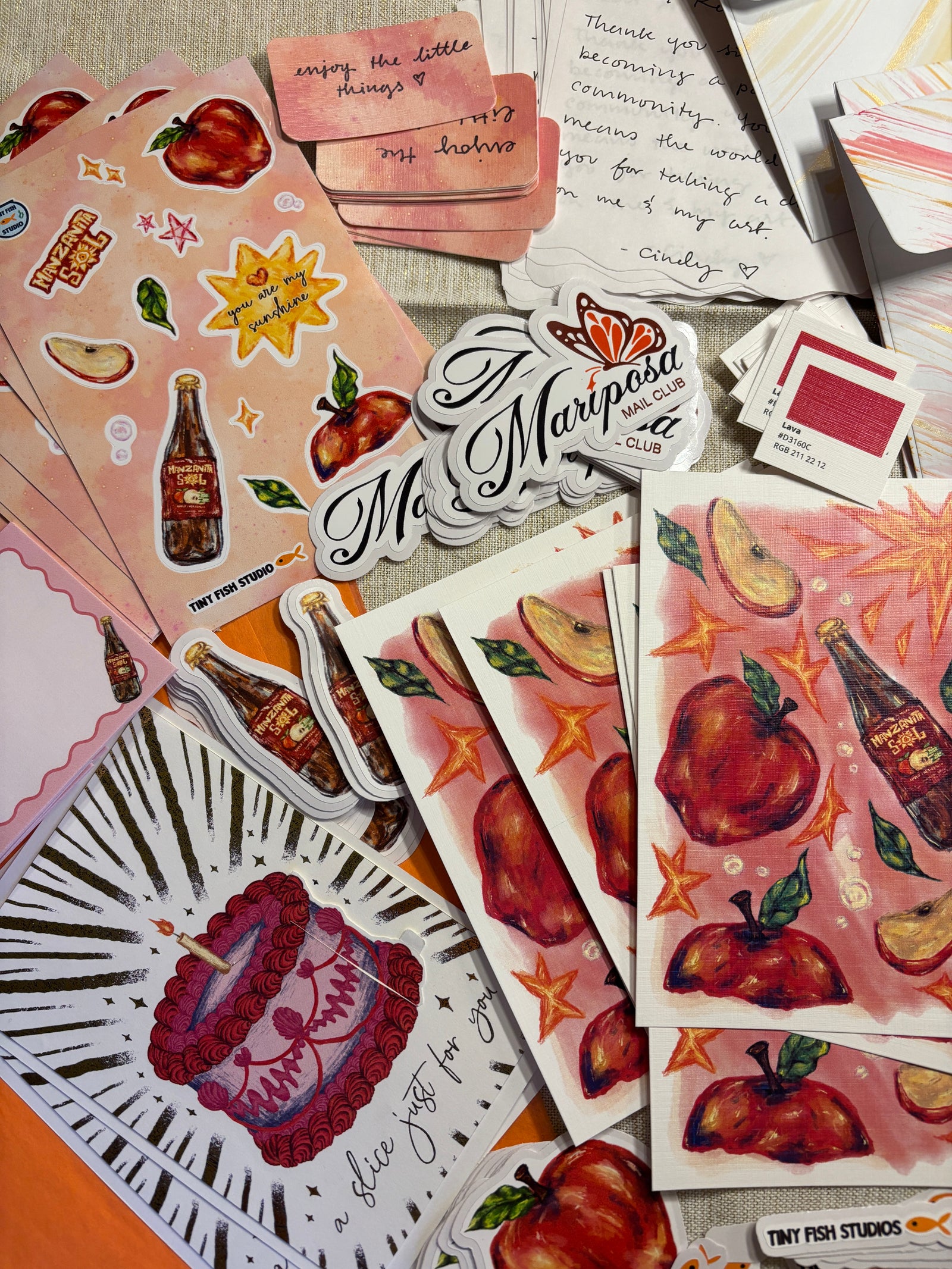 Collection of stickers with various designs on a surface