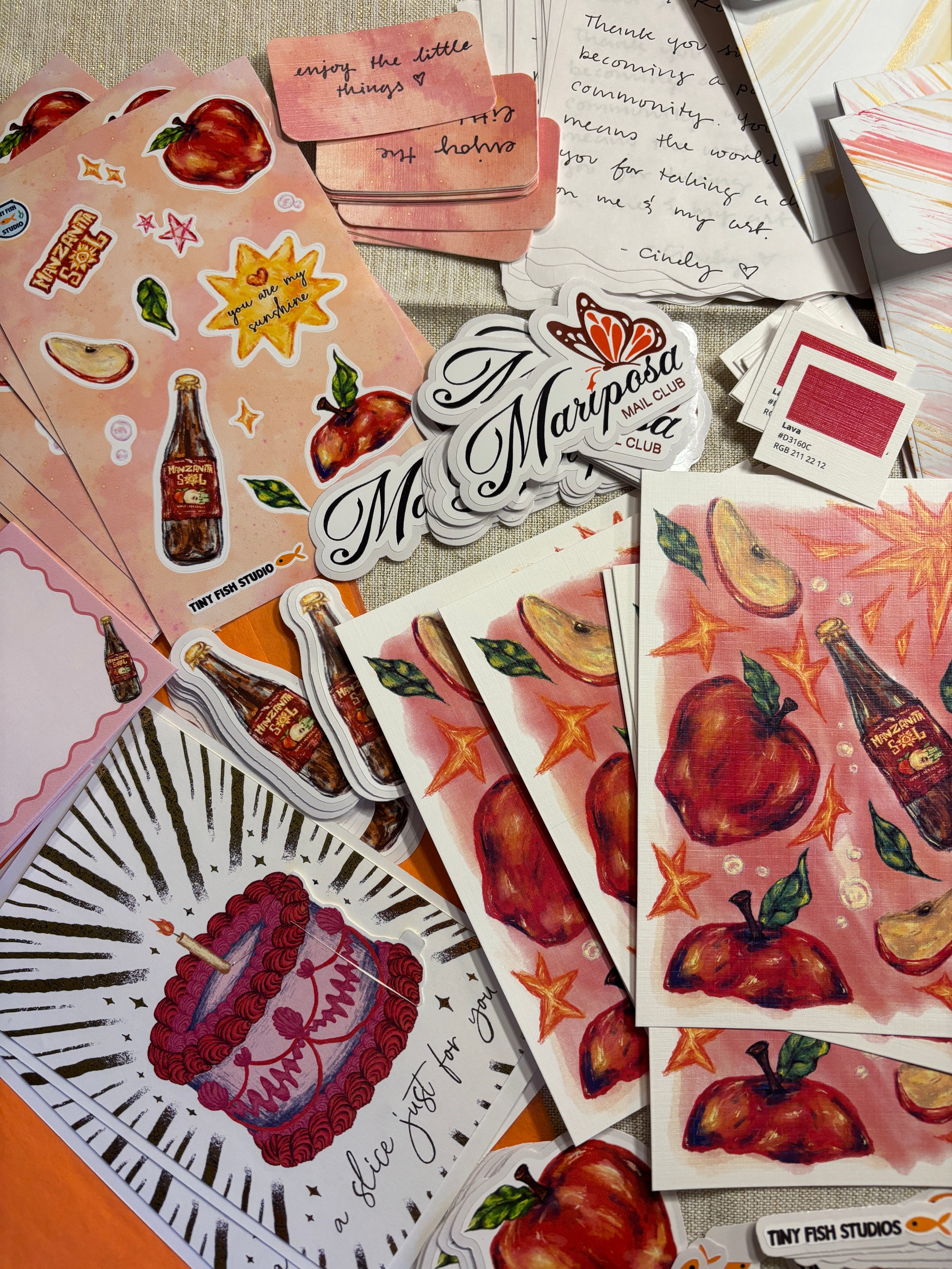 Collection of stickers with various designs on a surface